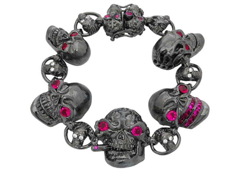 BR600-BK-RD Skull Jewelry Bracelet (Clasped) in Rhodium Plated Sterling Silver with Red Stones (Black Collection), designed by Steve Soffa