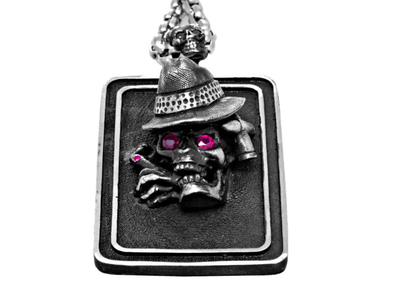 DT100-B The Gangster Skull Dog Tag in Sterling Silver with Rubies and Black Diamonds, designed by Steve Soffa