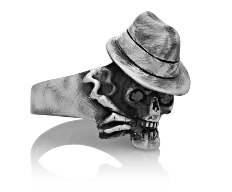 RG100-A The Gangster Skull Ring (Front Side View) in Sterling Silver with Black Stones, designed by Steve Soffa