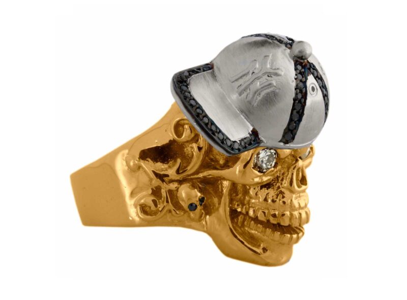 RG1002-B The Player Skull Ring (Right Side View) in Yellow Gold and White Gold, White Diamonds and Black Diamonds, designed by Steve Soffa