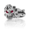 RG1008-B The Rock Star Skull Ring (Front View) in White Gold with Black Diamonds, White Diamonds and Rubies, designed by Steve Soffa