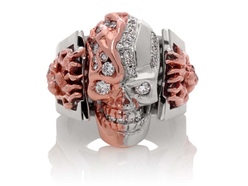 RG5000-A Two Face skull ring bi-color (Front View) in Rose and White Gold with White and Black Diamonds, designed by Steve Soffa