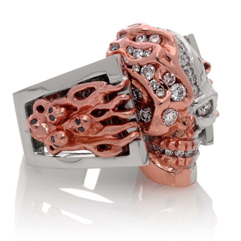 RG5000-A Two Face skull ring bi-color (Front Right Side View) in Rose and White Gold with White and Black Diamonds, designed by Steve Soffa