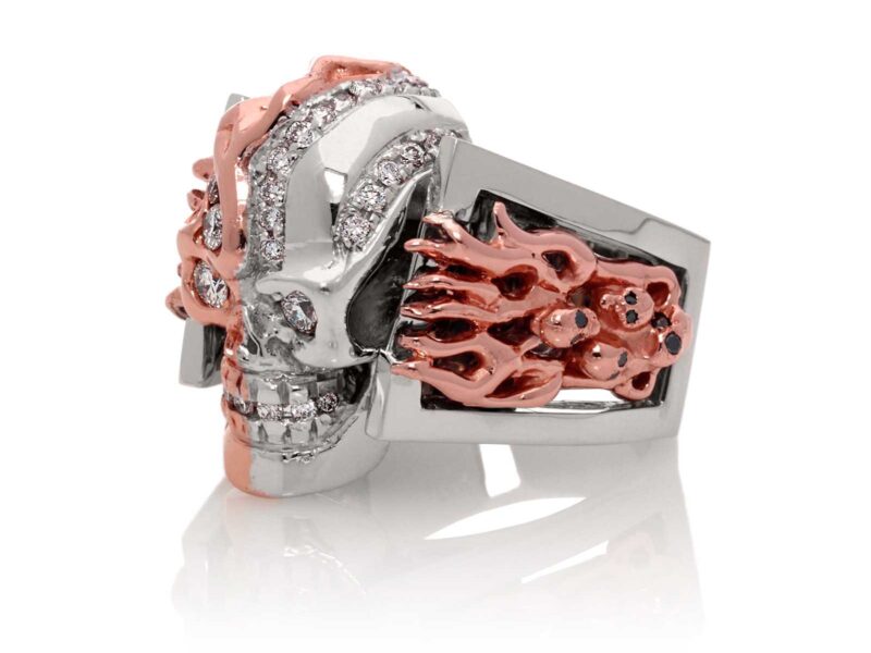 RG5000-A Two Face skull ring bi-color (Left Side View) in Rose and White Gold with White and Black Diamonds, designed by Steve Soffa