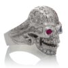 RG1006 The Freedom Rider Skull Ring (Right Side) in White Gold with White Diamonds, Red Rubies and Blue Sapphire (Diamond Collection), designed by Steve Soffa