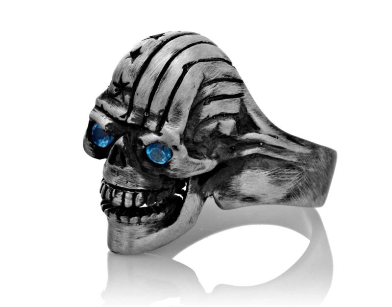 RG106-A The Freedom Rider Skull Ring (Left Front Side View) in Silver with Blue Stones, designed by Steve Soffa