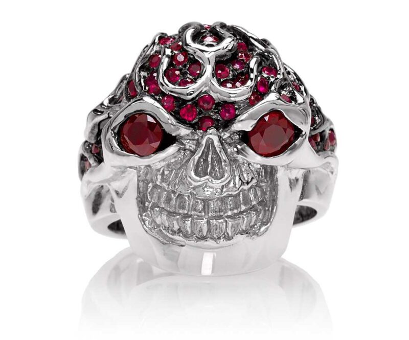 RG3022WG-A Blazing Bruno Skull Ring (Front View) in White Gold with Rubies, designed by Steve Soffa