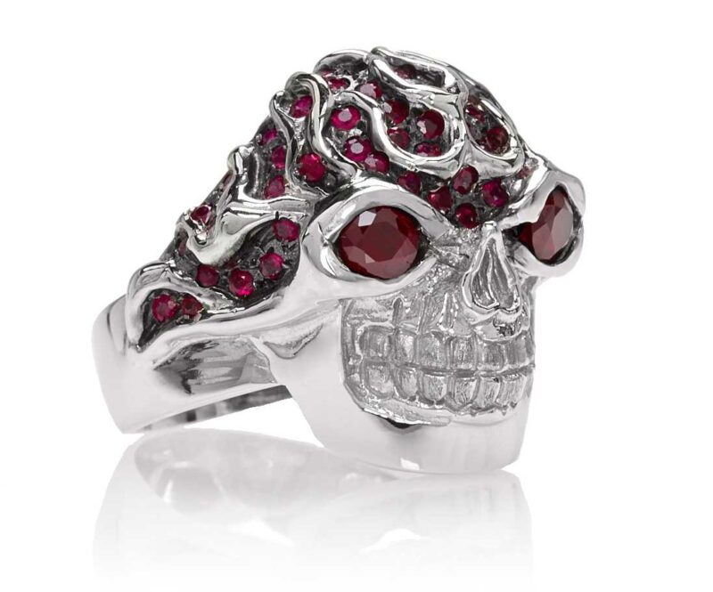 RG3022WG-A Blazing Bruno Skull Ring (Front Side View) in White Gold with Rubies, designed by Steve Soffa