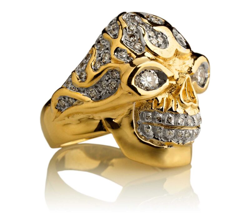 RG3022YG-A Blazing Bruno Skull Ring (Front Side View) in Yellow Gold with White Diamonds, designed by Steve Soffa