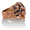 RG1008-A The Rock Star Skull Ring (Right Side View) in Rose/White Gold, with Black/White Diamonds and Rubies, designed by Steve Soffa