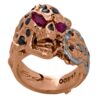 RG1008-A The Rock Star Skull Ring (Front Bottom View) in Rose/White Gold, with Black/White Diamonds and Rubies, designed by Steve Soffa