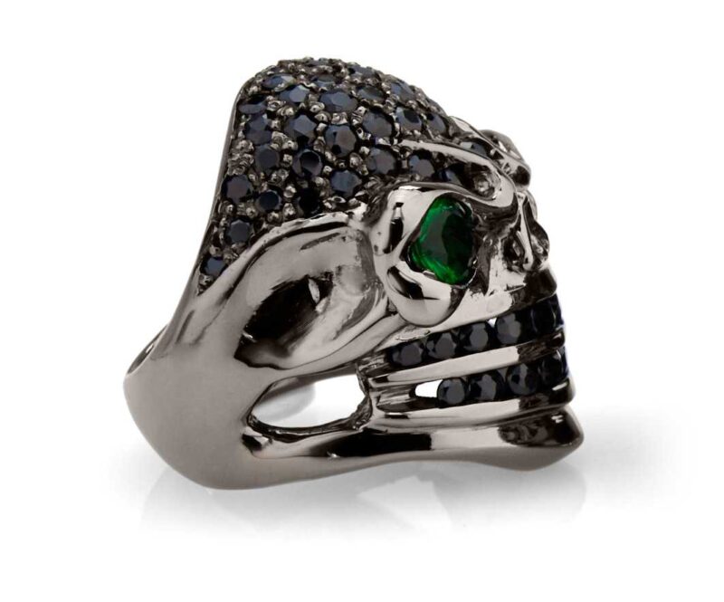 RG326BK-GRN-BK Venomous Val Skull Ring (Side View) in Sterling Silver with Green & White Stones (Black Collection), designed by Steve Soffa