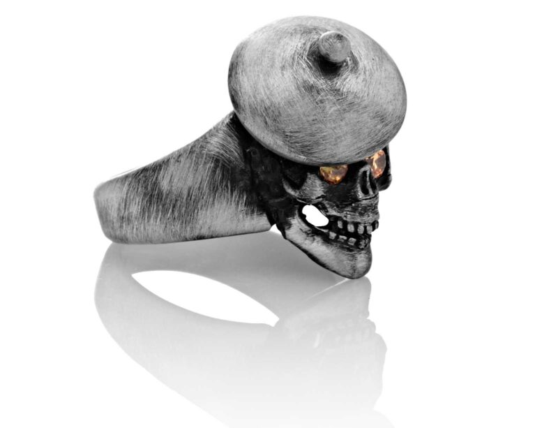 RG104-B The Artist Skull Ring (Right Front Side View) in Sterling Silver with Amber Stones, designed by Steve Soffa