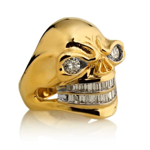 RG3024YG Sinister Sid Skull Ring (Front Side View) in Yellow Gold with White Diamonds, designed by Steve Soffa