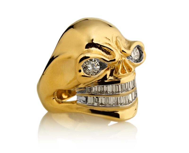 RG3024YG Sinister Sid Skull Ring (Front Side View) in Yellow Gold with White Diamonds, designed by Steve Soffa