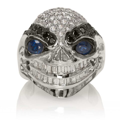 RG3028 Wicked Willy skull ring (Front View) in White Gold with White & Black Diamonds, Blue Sapphires, designed by Steve Soffa