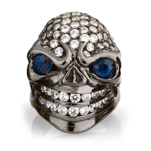 RG326BK-BL-WHT Sarcastic Sally Skull Ring (Front View) in Sterling Silver with Blue & White Stones (Black Collection), designed by Steve Soffa