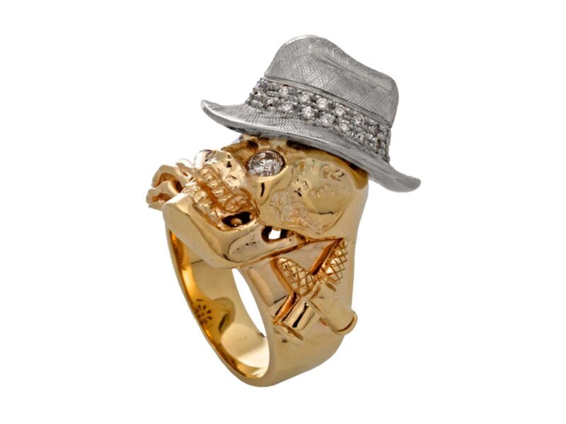 RG1000-A The Gangster Skull Ring (Side View) in Yellow & White Gold with White Diamonds, designed by Steve Soffa