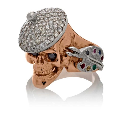 RG1004-A The Artist Skull Ring (Left Front View) in Rose and White Gold, with White and Black Diamonds, designed by Steve Soffa