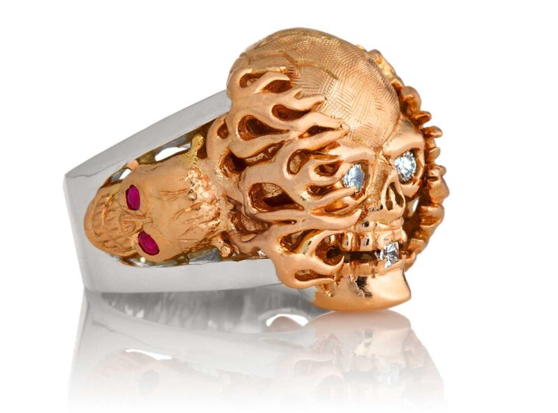 RG1020RGSIL Hot Head Harry Skull Ring (Right Side View) in Rose Gold and Silver with White Diamonds and Red Rubies, designed by Steve Soffa