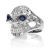 RG3026WG-A Vicious Vinnie Skull Ring (Front Side View) in White Gold with White Diamonds and Blue Sapphires, designed by Steve Soffa