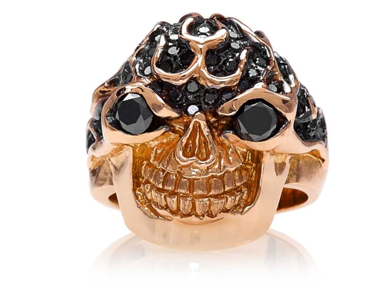 RG3022RG-A Blazing Bruno Skull Ring (Front View) in Rose Gold with Black Diamonds, designed by Steve Soffa