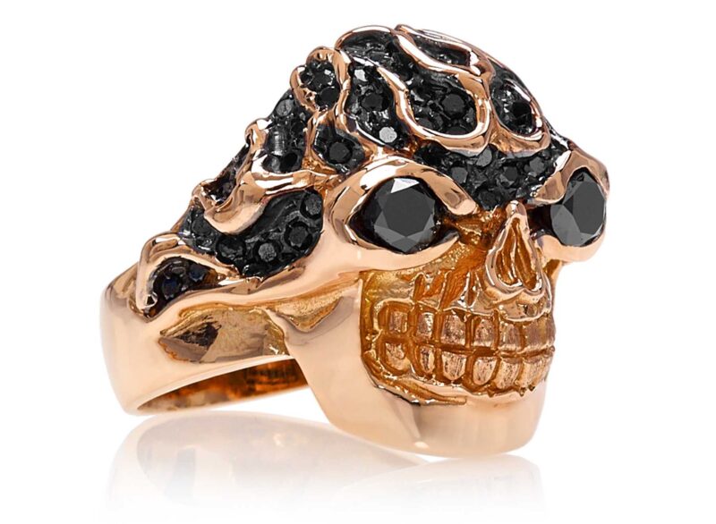 RG3022RG-A Blazing Bruno Skull Ring (Front Side View) in Rose Gold with Black Diamonds, designed by Steve Soffa