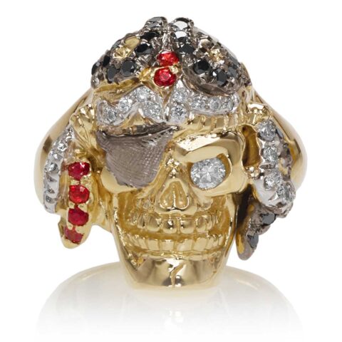 RG1042 Captain Morgan Men's Pirate Skull Ring (Front View) in Yellow Gold with White and Black Diamonds, with Orange Sapphires, designed by Steve Soffa