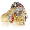 RG1042 Captain Morgan Men's Pirate Skull Ring (Front Right View) in Yellow Gold with White and Black Diamonds, with Orange Sapphires, designed by Steve Soffa