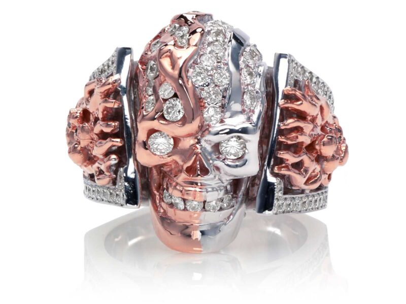 RG5000-B Two Face skull ring (Front View) in Rose and White Gold with White and Black Diamonds, designed by Steve Soffa